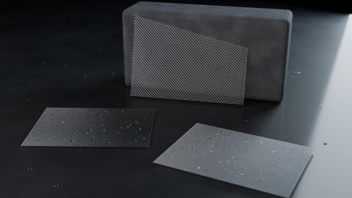 V4A stainless steel wire mesh sheets with water droplets on wet dark stone, one leaning against a granite block